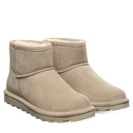 BEARPAW Women's Alyssa Boot in Lemon Pepper worn on foot with casual cold-weather styling for a cozy everyday look.