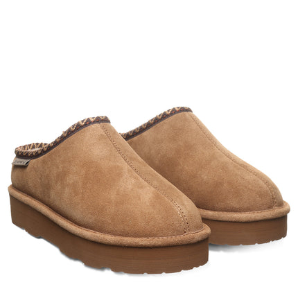 BEARPAW Women's Martis Clog in Hickory worn on foot with casual styling, highlighting the easy slip-on silhouette for everyday wear.