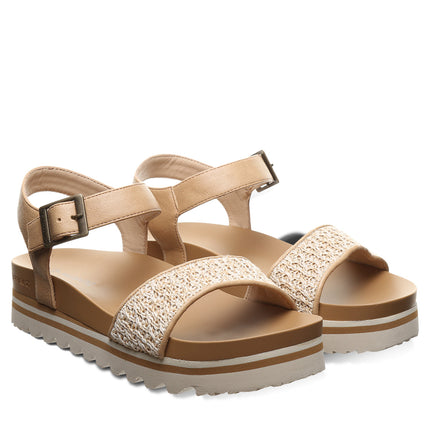 BEARPAW Women's Orion Sandal in Natural worn on foot with casual warm-weather styling for everyday summer wear.