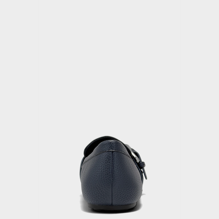 Rear view of the Aerosoles Dinetta loafer in navy faux pebbled leather featuring a structured heel counter and clean finish.