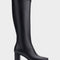Aerosoles Micah women's black faux leather knee-high boot with block heel, angled view