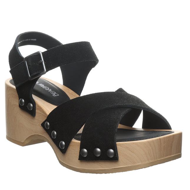 Bearpaw Colette sandal in black suede angle view featuring wooden platform sole, crossover straps and adjustable buckle closure