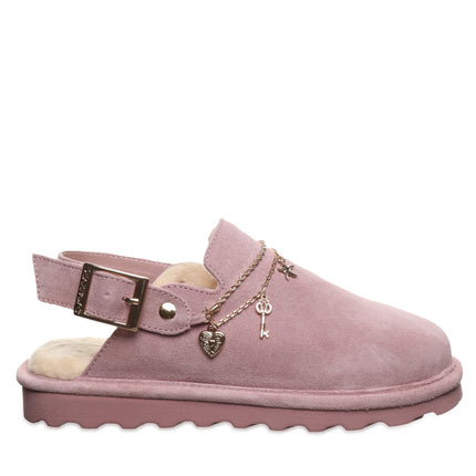 Side view of Bearpaw Lexi clog in peony featuring suede upper, buckle strap and charm detailing