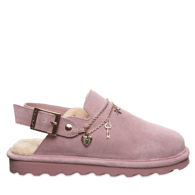 Side view of Bearpaw Lexi clog in peony featuring suede upper, buckle strap and charm detailing