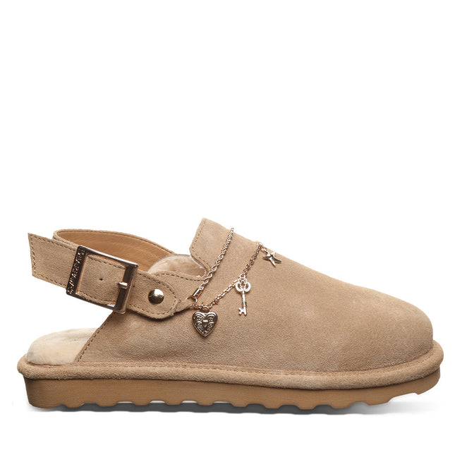 Side view of Bearpaw Lexi clog in toffee featuring suede upper, buckle strap and charm detailing
