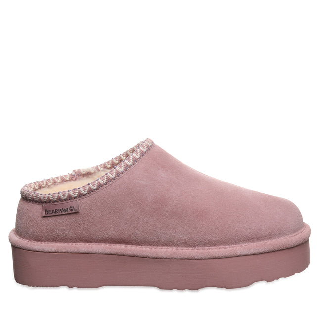 Side view of the Bearpaw Martis peony pink clog highlighting the cow suede upper and platform midsole